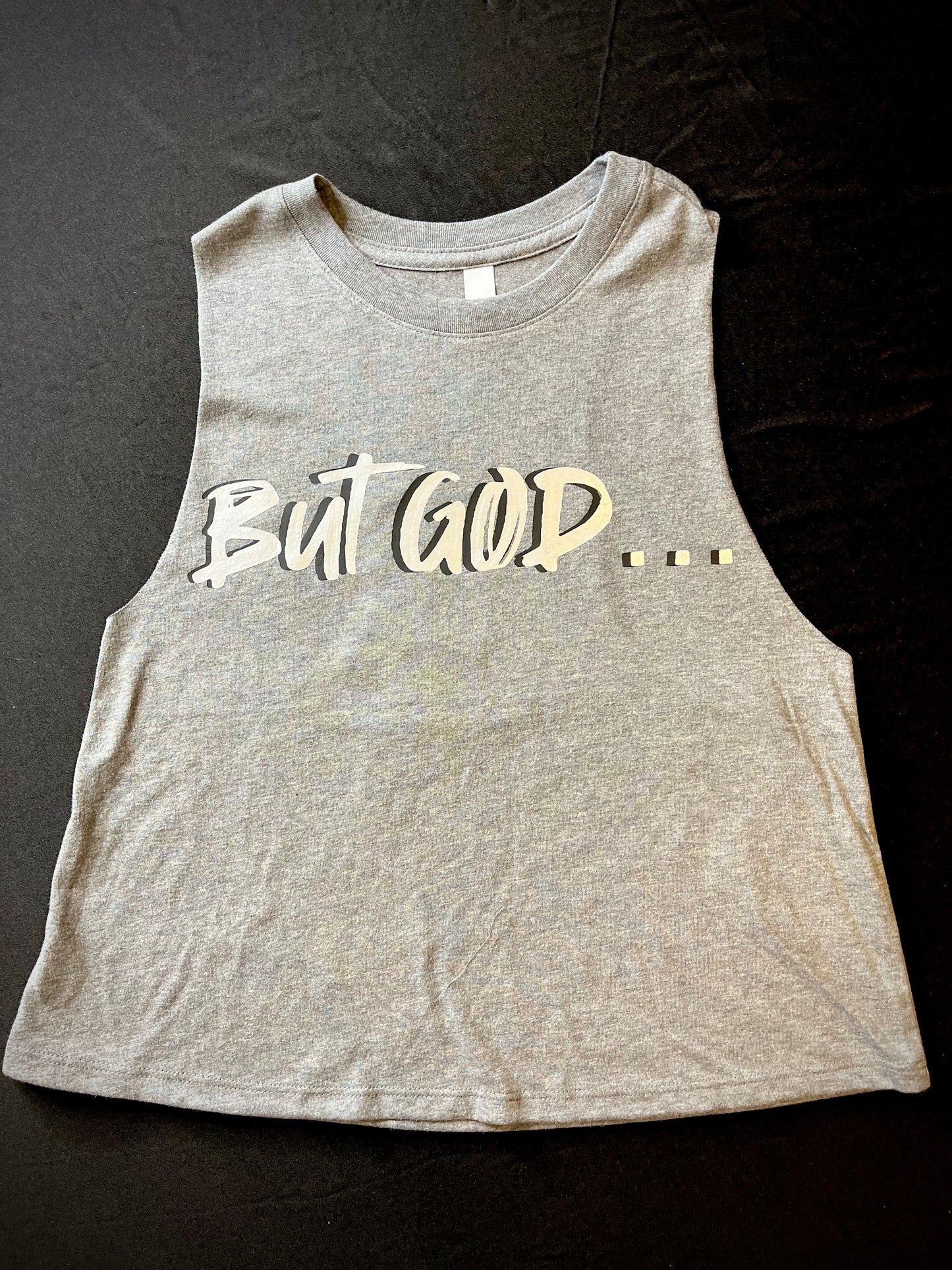 Light weight, racerback, crop top tank. Gray with silver metallic writing.